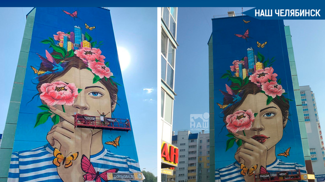 😉🌸На фасаде одного из домов по улице Бейвеля появилась шикарная красотка с городом и цветами в волосах. 